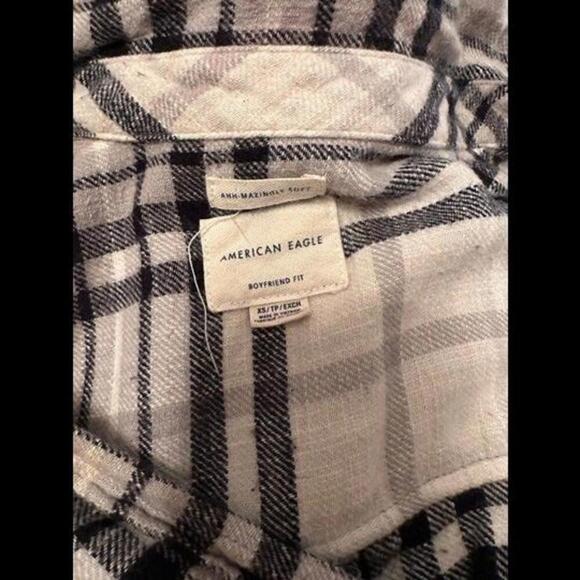 Elevate Your Style with Our White and Black Plaid Long Sleeve Shirt! - Picture 2 of 2